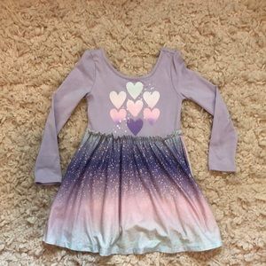 Like new. Adorable heart themed dress